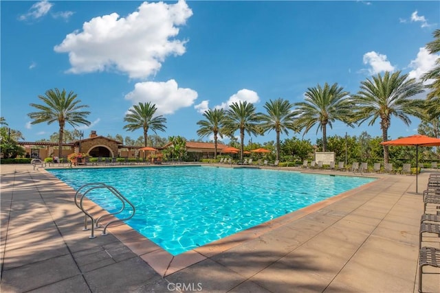 pool with a patio