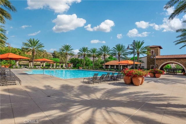 pool featuring a patio area