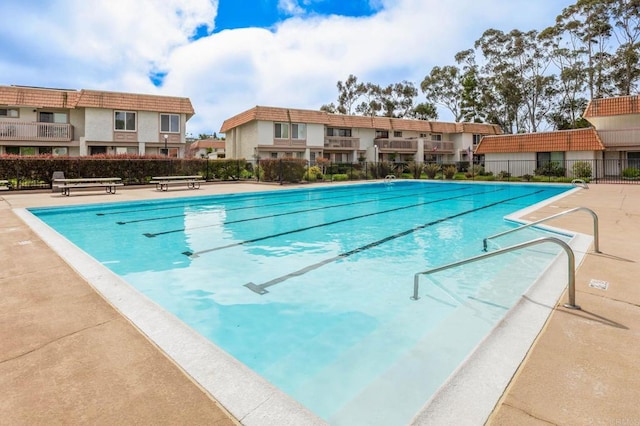 pool featuring fence