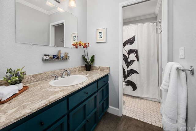 bathroom with vanity, crown molding, and curtained shower