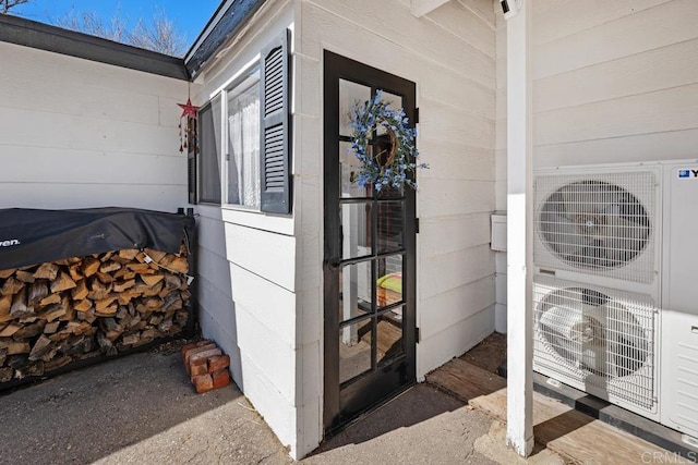 entrance to property featuring ac unit