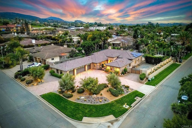 aerial view with a mountain view and a residential view