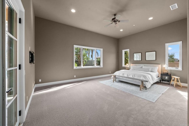 bedroom with carpet floors, recessed lighting, baseboards, and a ceiling fan