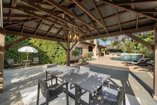view of patio featuring a gazebo, outdoor dining area, and an outdoor pool