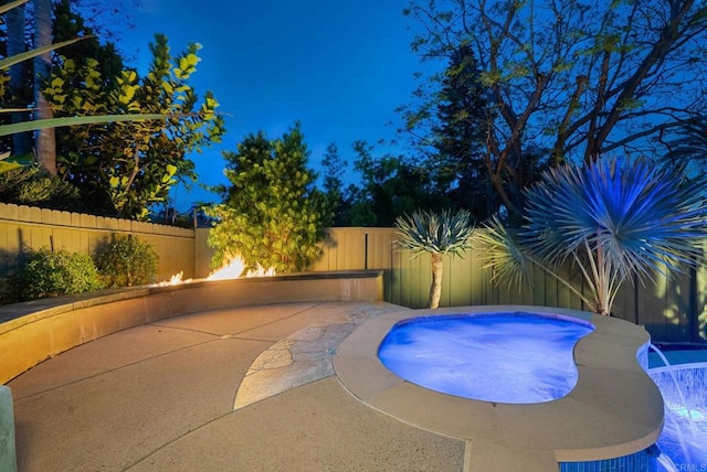 view of swimming pool featuring a patio, a fenced backyard, and a pool