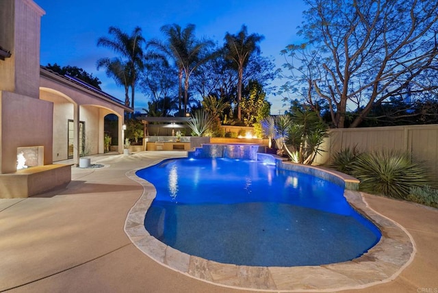 view of pool with a fenced in pool, a fenced backyard, and a patio area