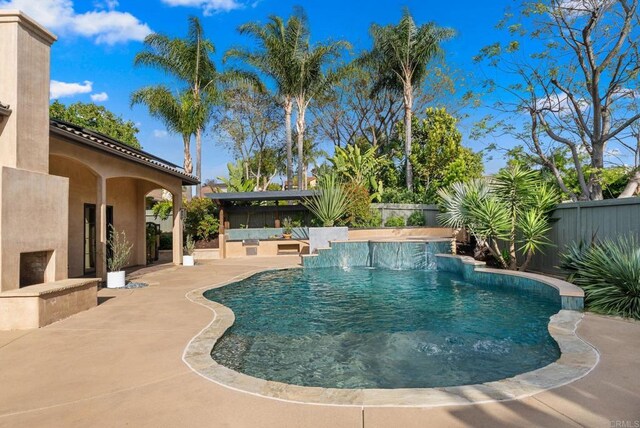 view of swimming pool with a fenced in pool, a fenced backyard, and a patio