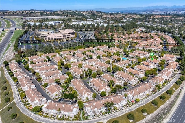 bird's eye view featuring a mountain view and a residential view