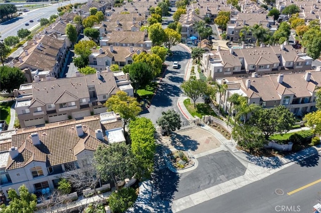 birds eye view of property with a residential view