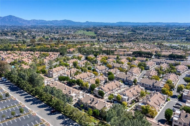 drone / aerial view with a mountain view and a residential view