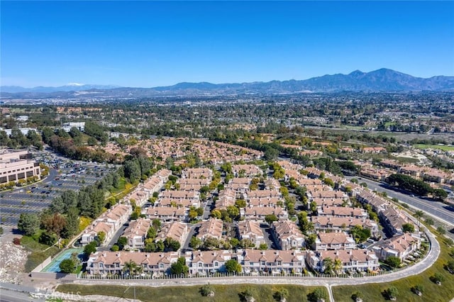 drone / aerial view featuring a mountain view and a residential view