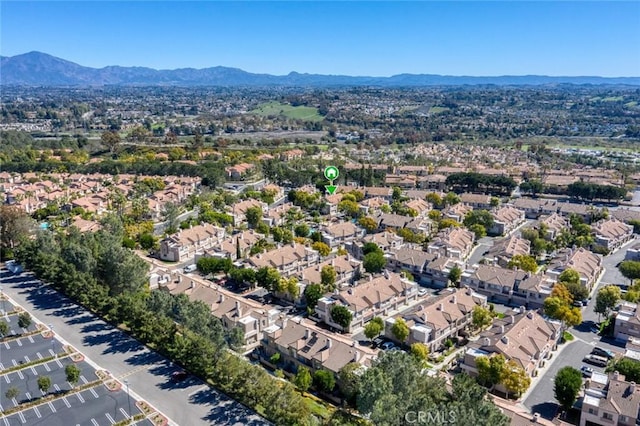 birds eye view of property featuring a residential view and a mountain view