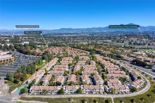 drone / aerial view featuring a mountain view