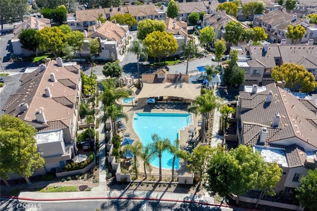 birds eye view of property with a residential view