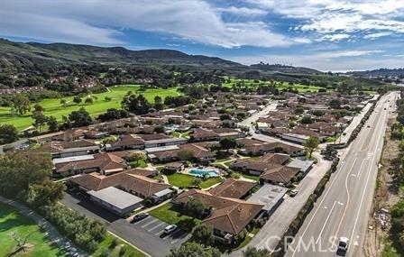 drone / aerial view with a mountain view and a residential view