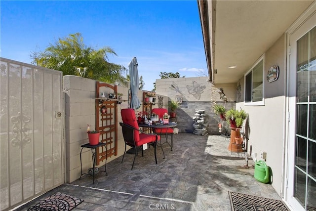 view of patio with fence