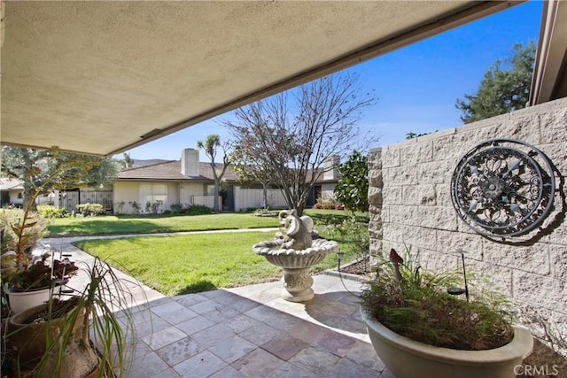 view of patio with fence