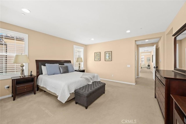 bedroom featuring recessed lighting, baseboards, and light colored carpet