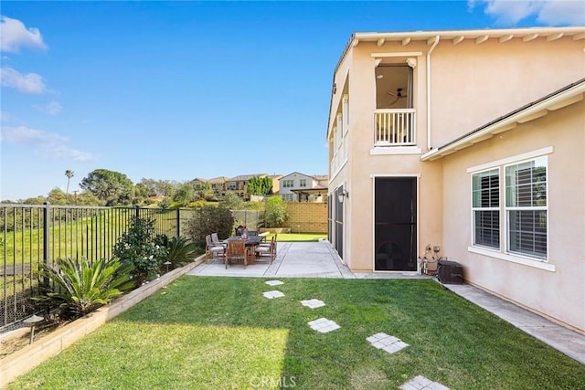 view of yard featuring a patio and a fenced backyard