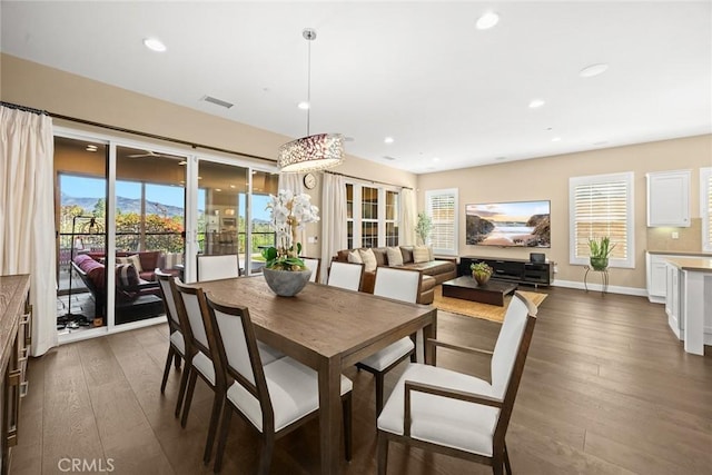 dining space featuring visible vents, recessed lighting, and dark wood-type flooring