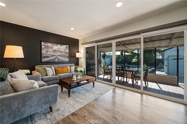 living area featuring recessed lighting and wood finished floors