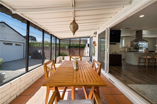 sunroom featuring a wealth of natural light