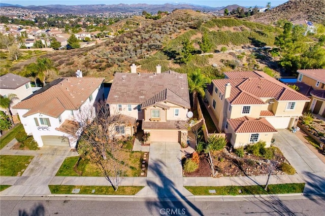 birds eye view of property featuring a residential view and a mountain view