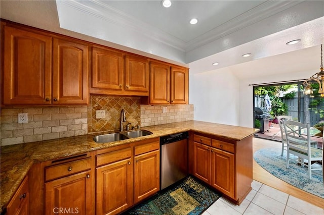 kitchen with a sink, dishwasher, a peninsula, and brown cabinetry