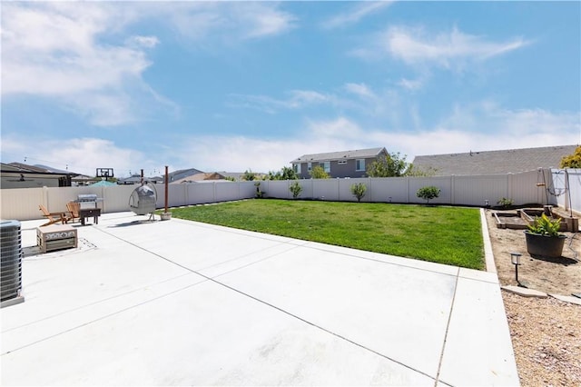 view of patio / terrace featuring a fenced backyard and a garden