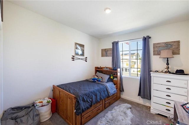 carpeted bedroom with baseboards