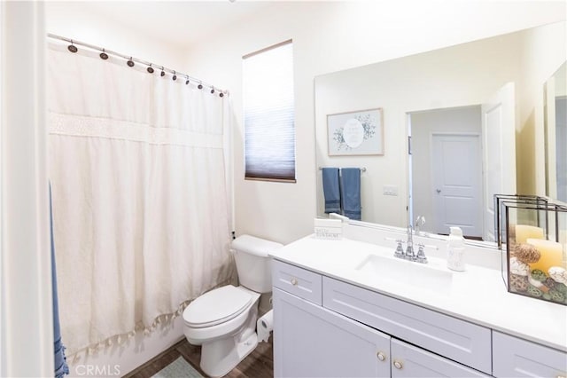 full bathroom with toilet, vanity, and shower / bath combination with curtain