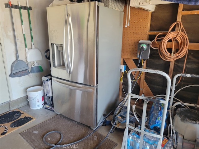 316 Mcbroom Ave, Barstow, CA 92311 - kitchen with stainless steel fridge with ice dispenser and unfinished concrete floors