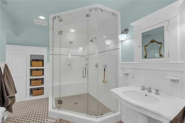 bathroom with a shower stall