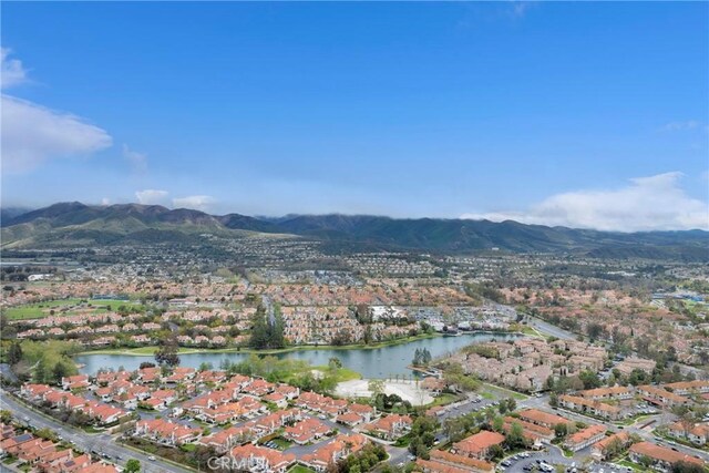 bird's eye view featuring a residential view and a water and mountain view