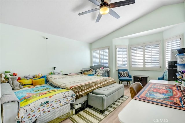 bedroom featuring a ceiling fan and vaulted ceiling