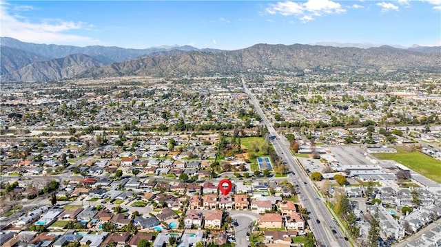 aerial view with a mountain view and a residential view