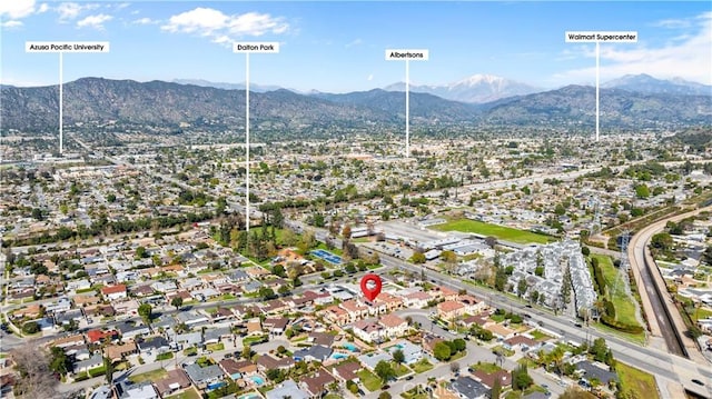 aerial view with a mountain view and a residential view