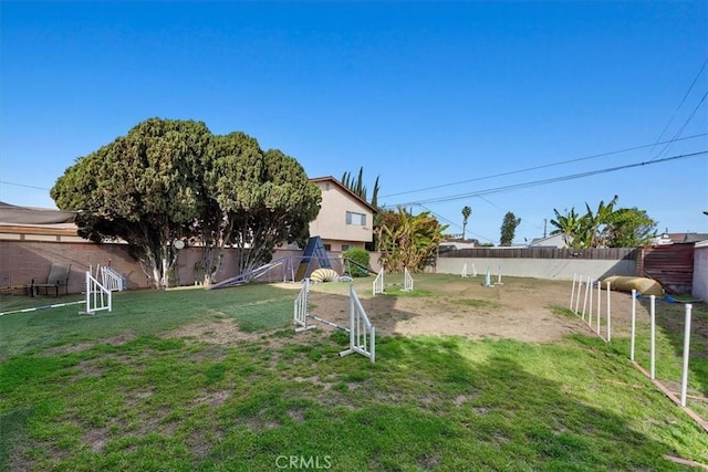 view of yard featuring a fenced backyard