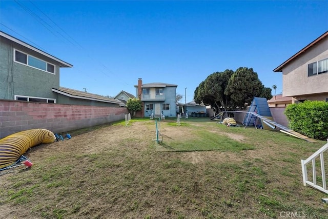 view of yard with a fenced backyard