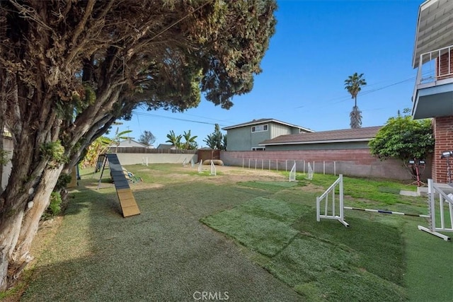 view of yard featuring fence