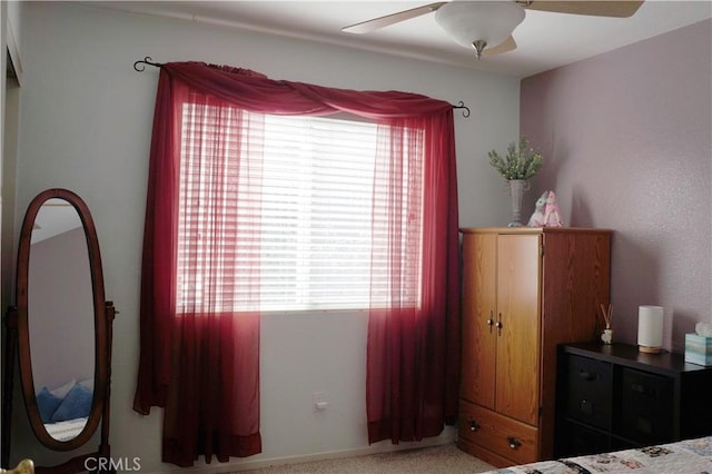 bedroom featuring ceiling fan