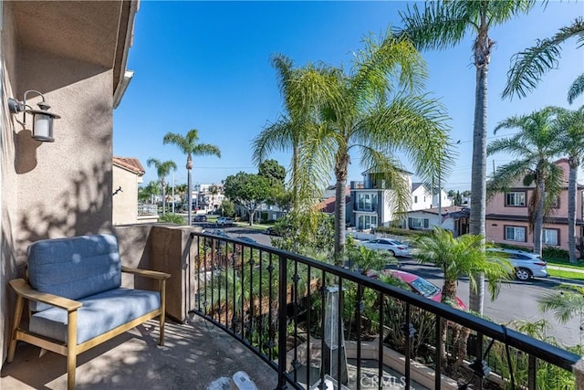 balcony featuring a residential view