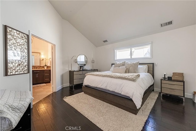 bedroom featuring hardwood / wood-style flooring, baseboards, visible vents, and high vaulted ceiling