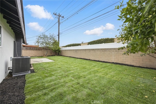 view of yard featuring a patio area, cooling unit, and a fenced backyard