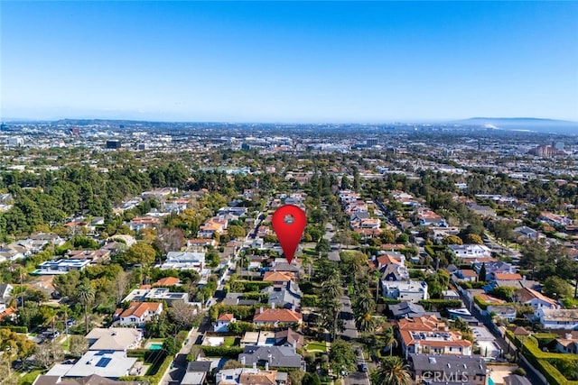 birds eye view of property with a residential view