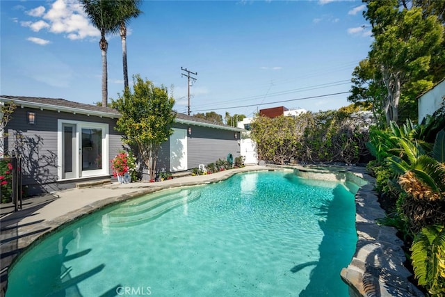 outdoor pool with a patio