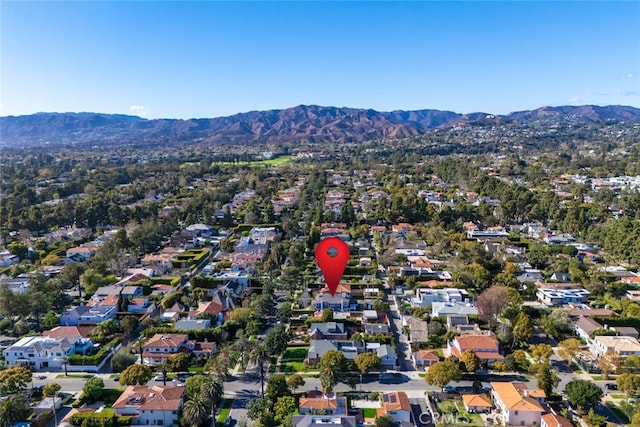 birds eye view of property with a residential view and a mountain view