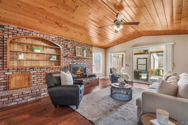 living area with wood ceiling, wood finished floors, and vaulted ceiling