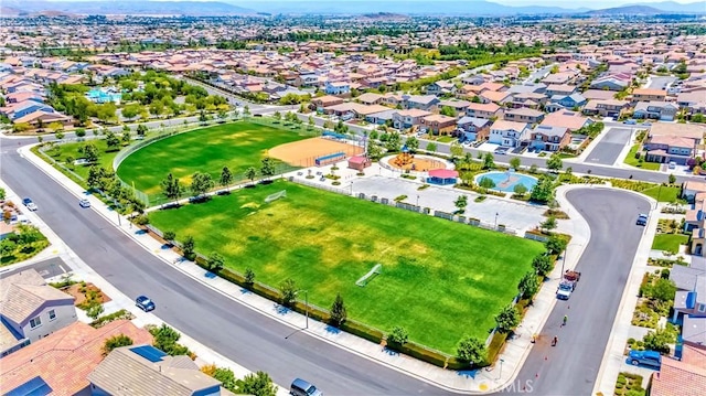 bird's eye view with a mountain view and a residential view