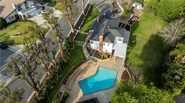 birds eye view of property with a residential view